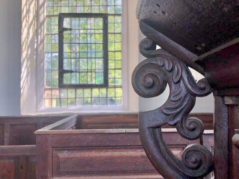 A view of the schoolroom lectern and pews.
Image: CMS Group